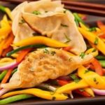 Pork Pot Stickers with Red Pepper Jam & Pickled Mango Slaw