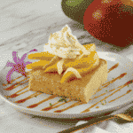Cold Smoked Ripe Mango with Mango Pound Cake, Brown Butter Rum Caramel, and Whipped Coconut Cremeux