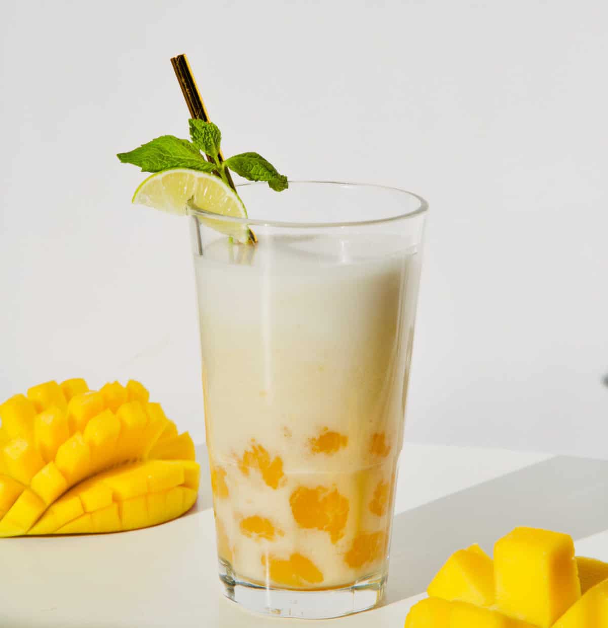 glass of mango boba tea and mango hedgehogs